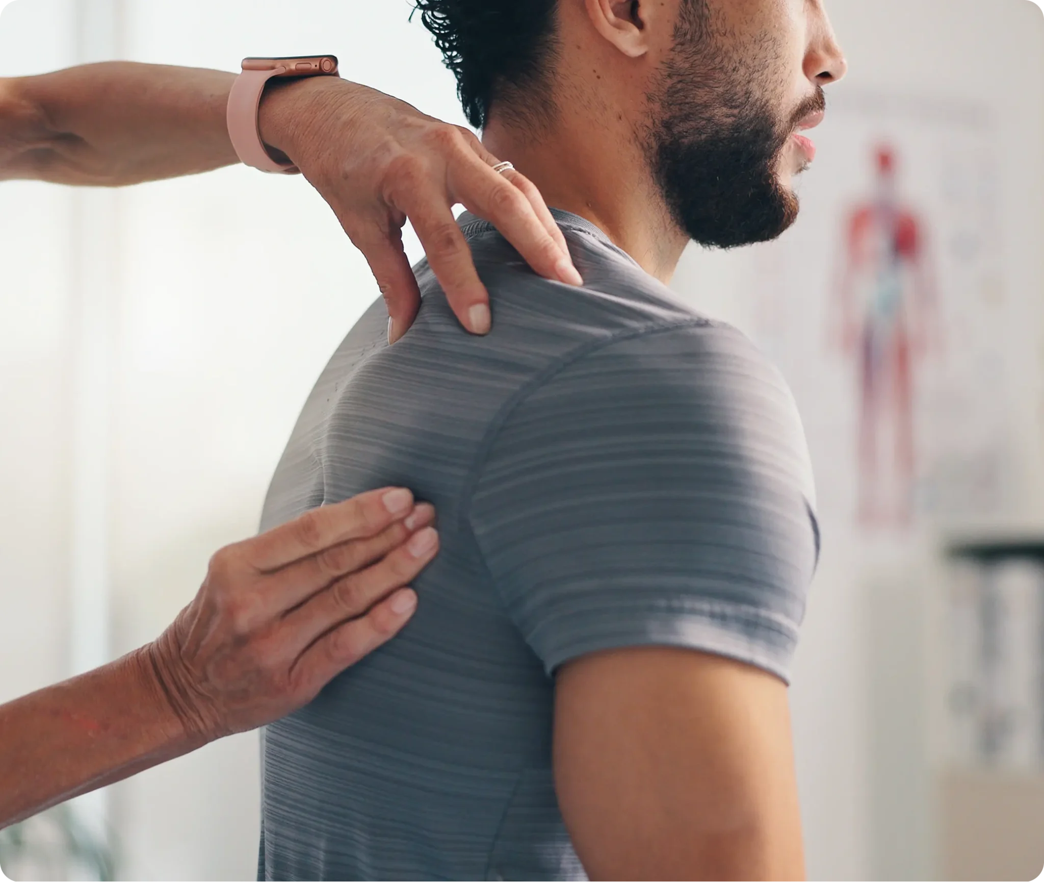 Dr. Ivan performing chiropractic evaluation at Novar&eacute; Injury Care