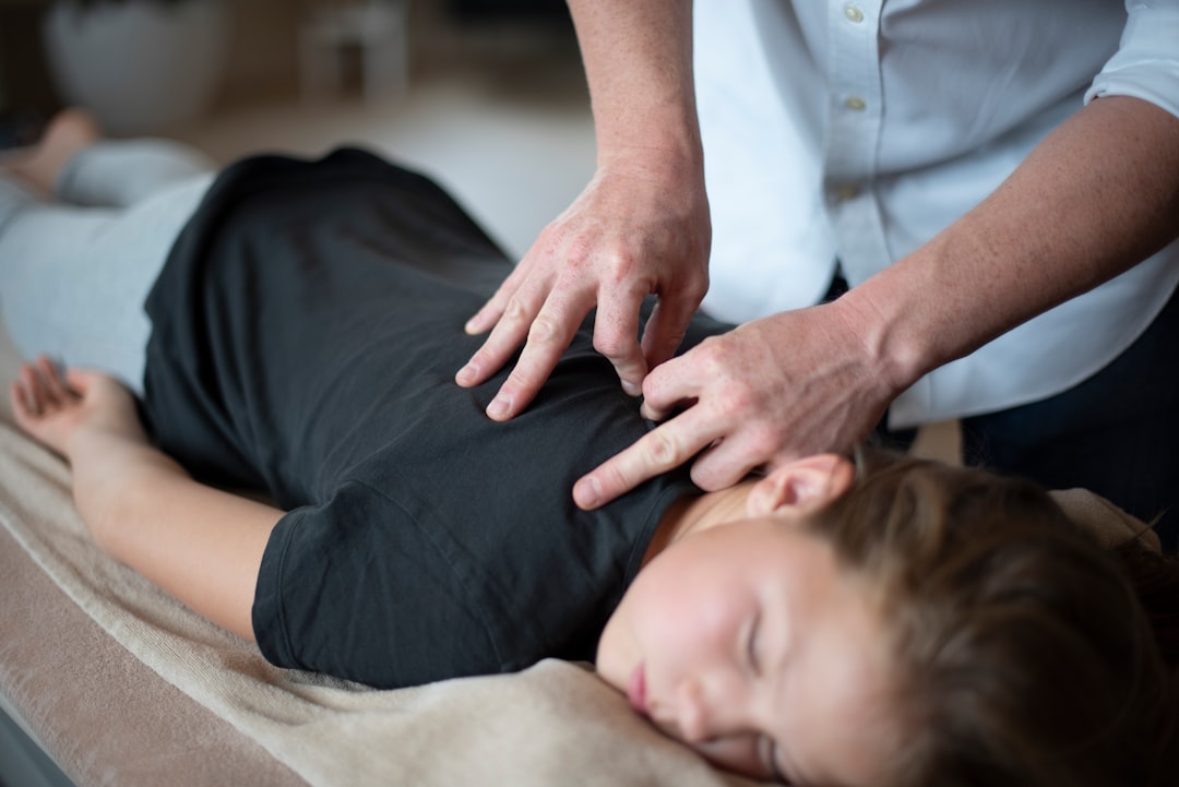 Dr. Ivan reviewing sciatica diagnosis with patient